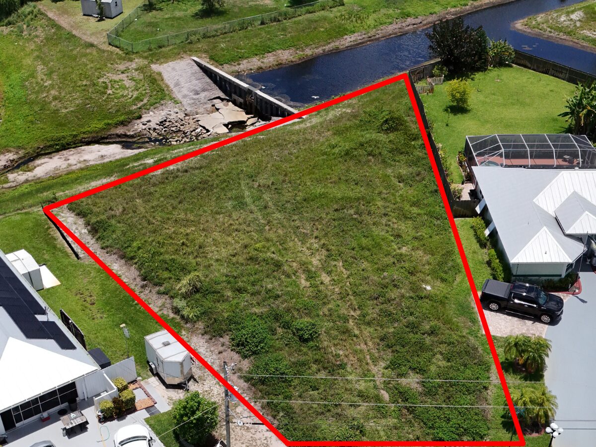 Aerial drone view of the empty lot before construction