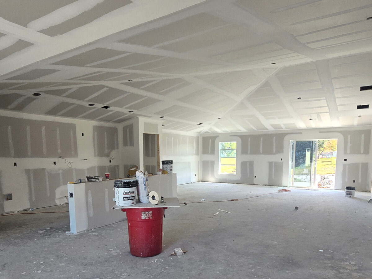 Drywall installed and mudded throughout the home