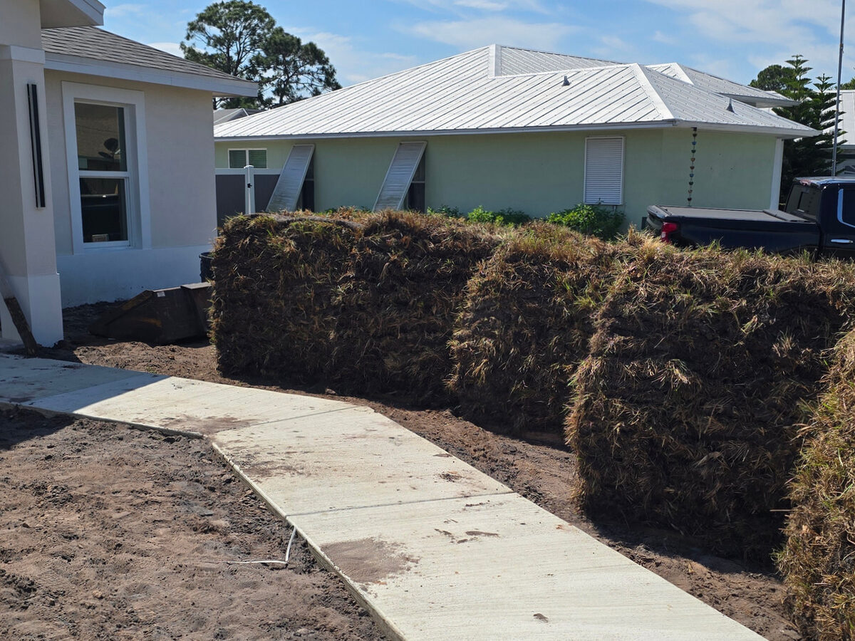 Sod being installed on the front and side yards
