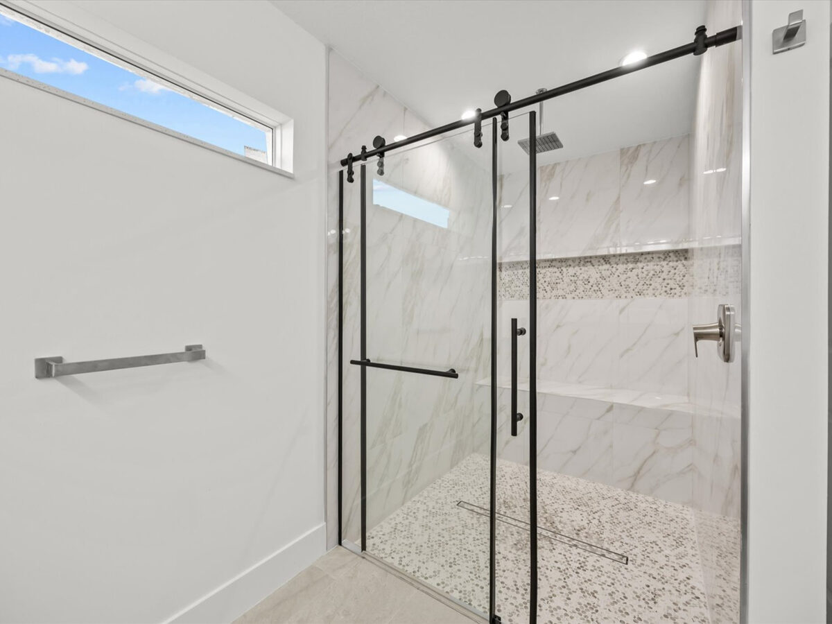 Master bathroom walk-in shower with tile surround