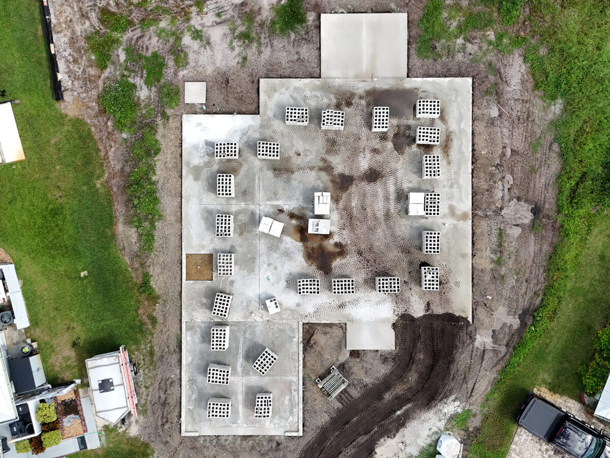 Aerial drone view of block walls erected on slab
