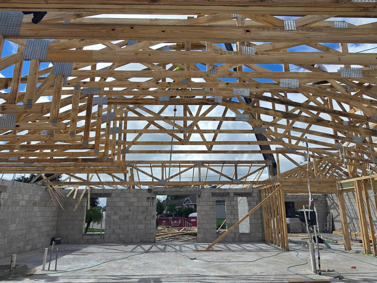 Trusses being positioned on the block walls