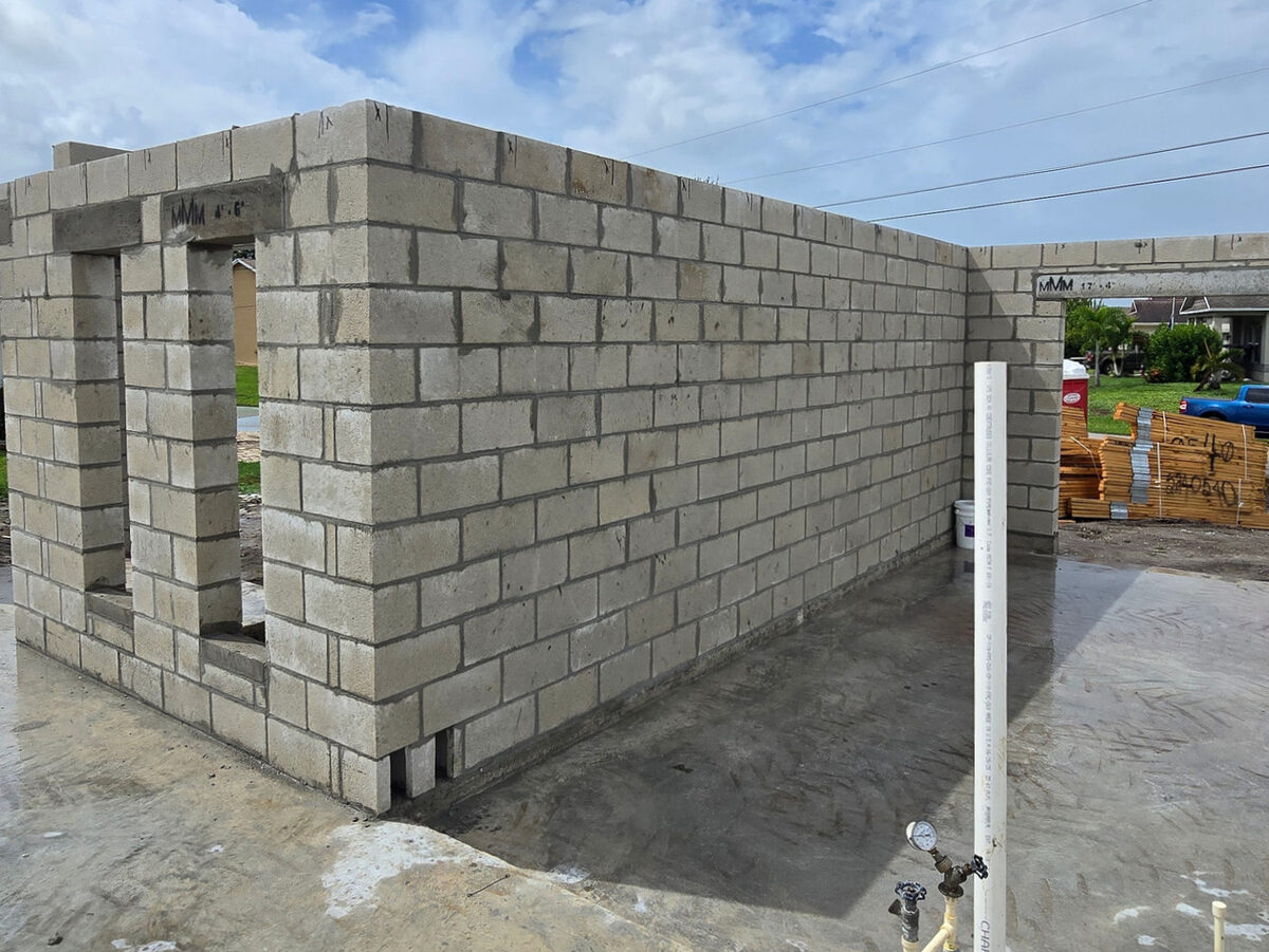 Completed block walls from ground level with door and window openings