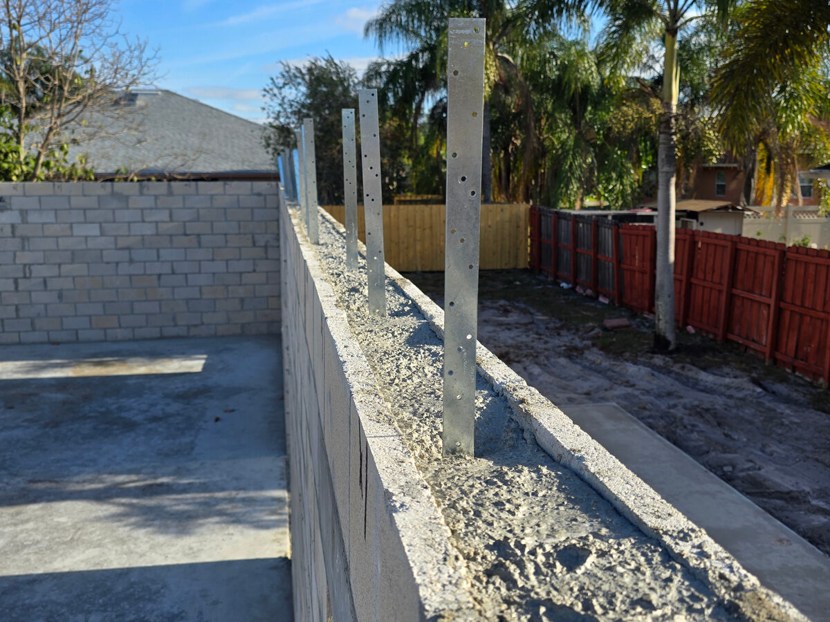 Block walls filled with concrete — structural walls complete