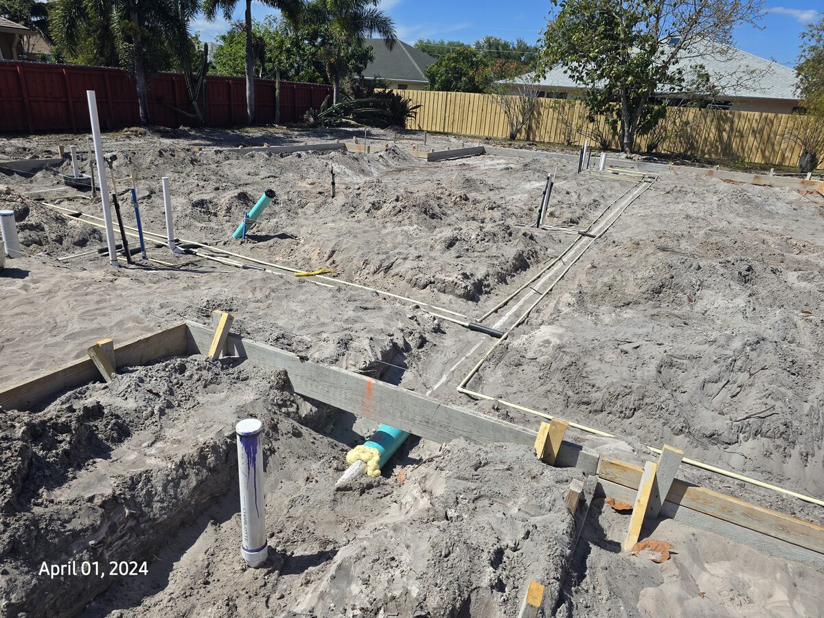 Underground plumbing pipes installed inside formboard