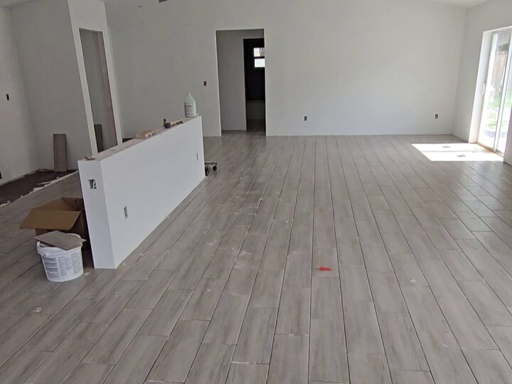 Wood-look tile flooring completed in open living area