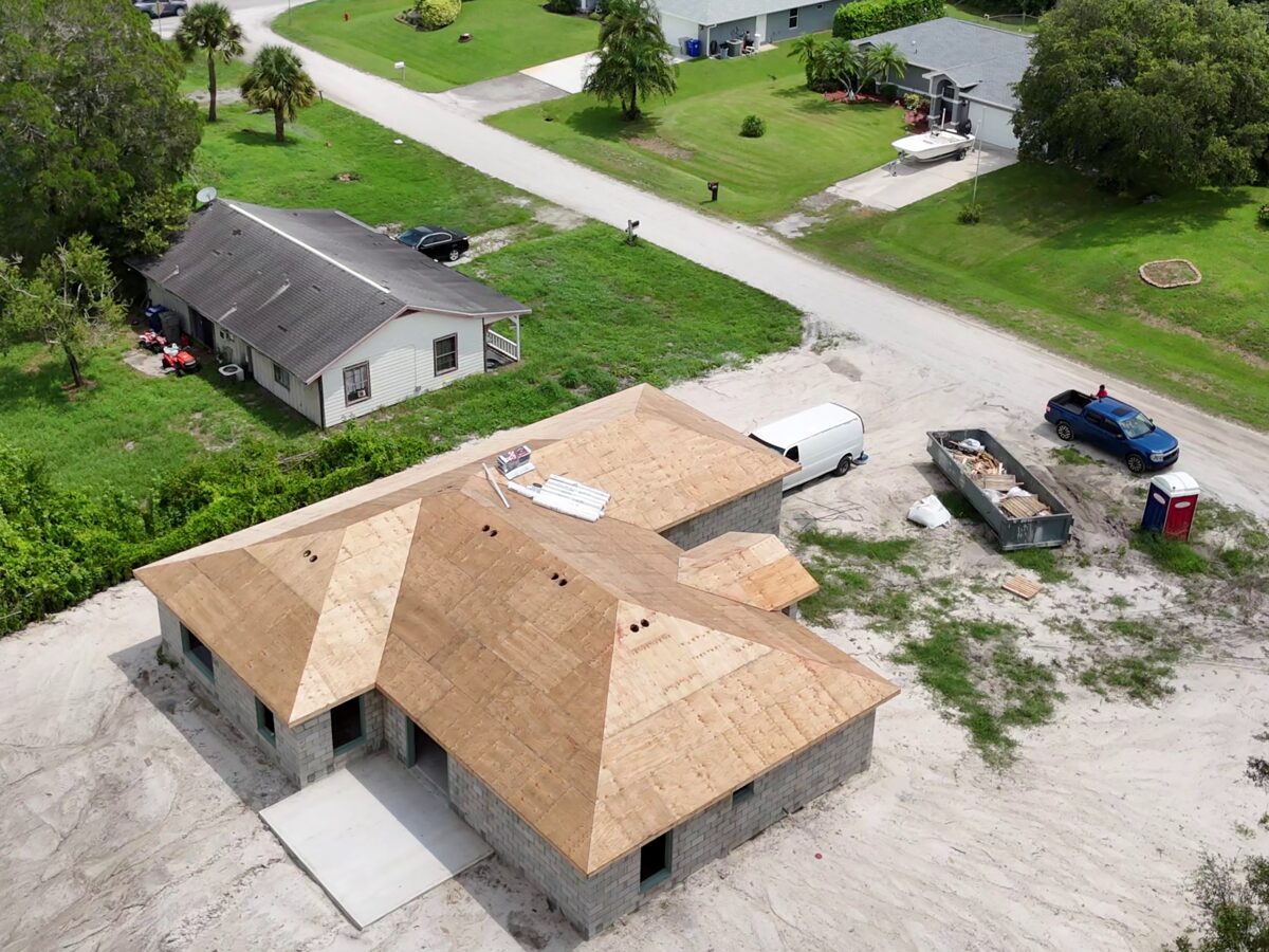Trusses being placed on top of CMU block walls