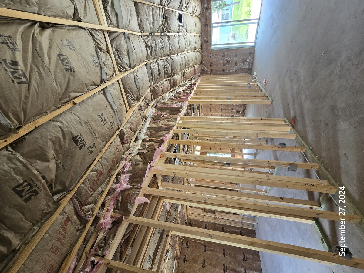 Interior with drywall installation beginning