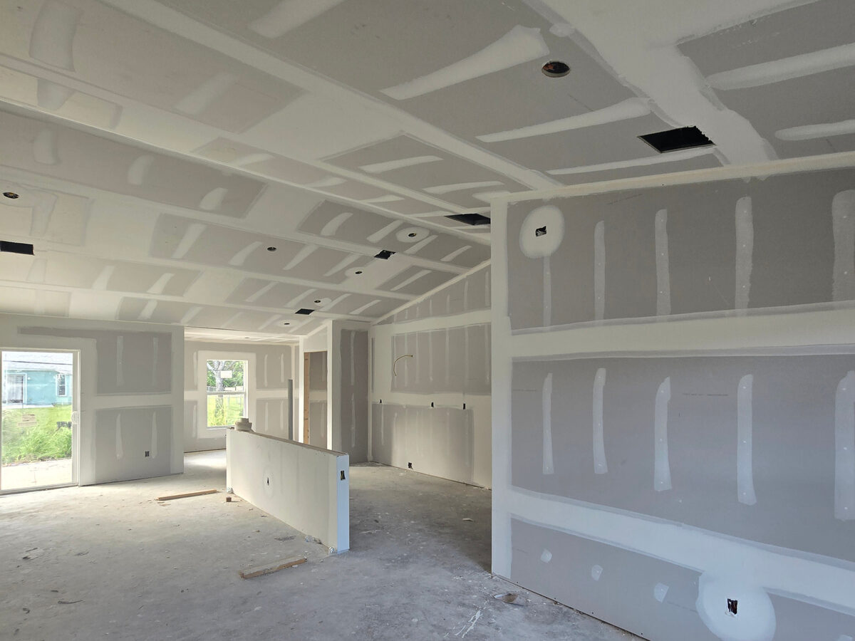 Kitchen with island, faucet, and pendant lighting installed