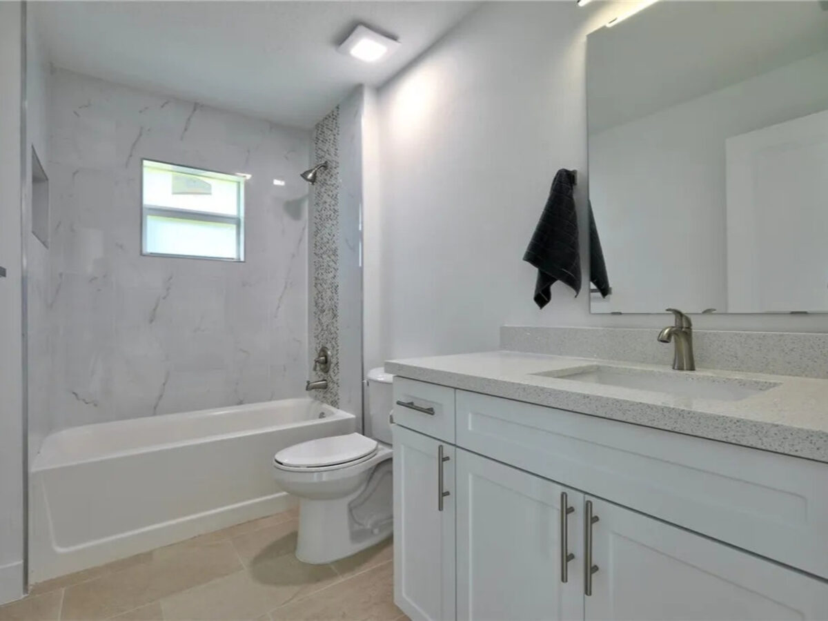 Guest bathroom with vanity and modern fixtures