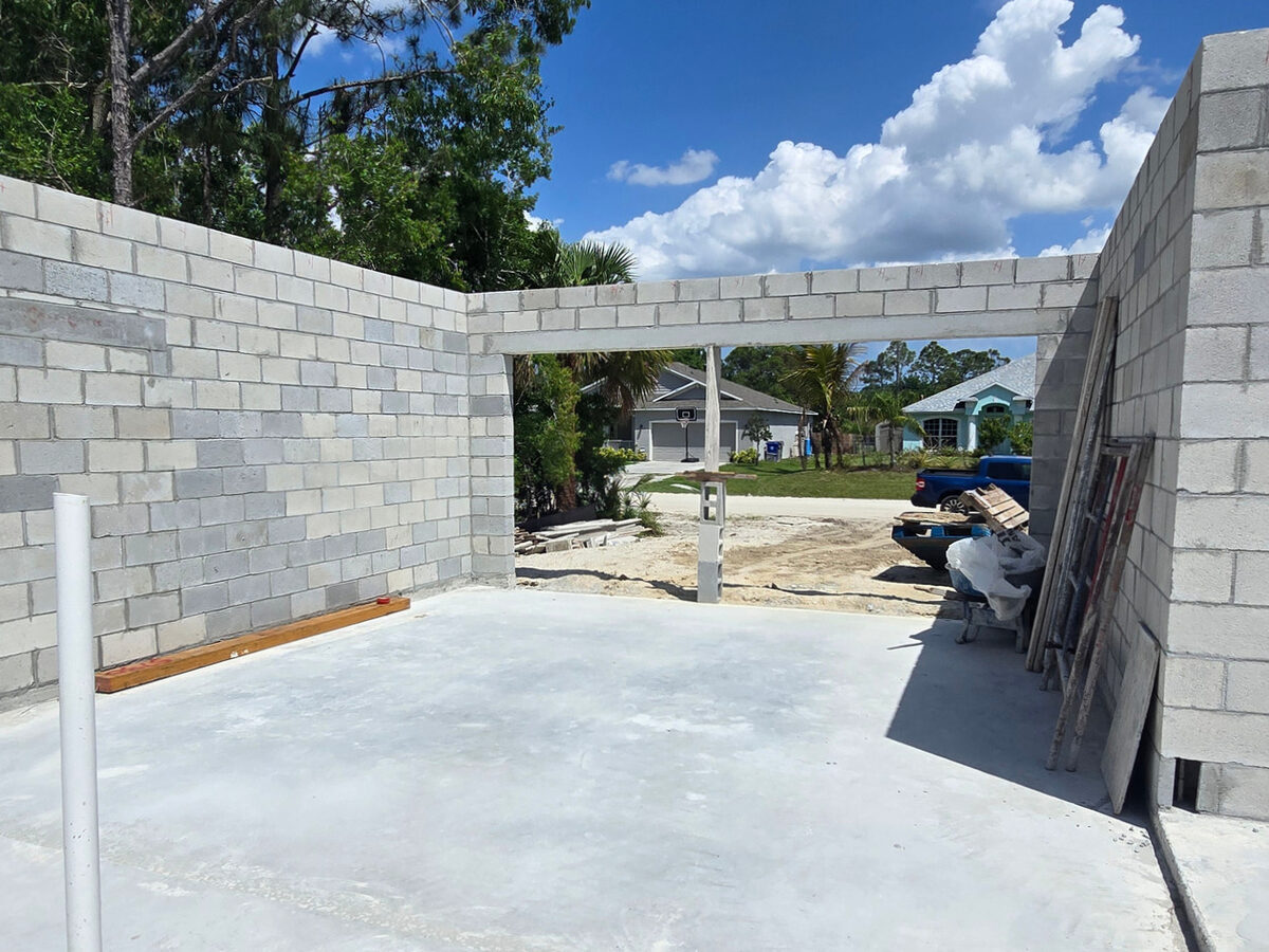 Garage opening with concrete lintel and block walls