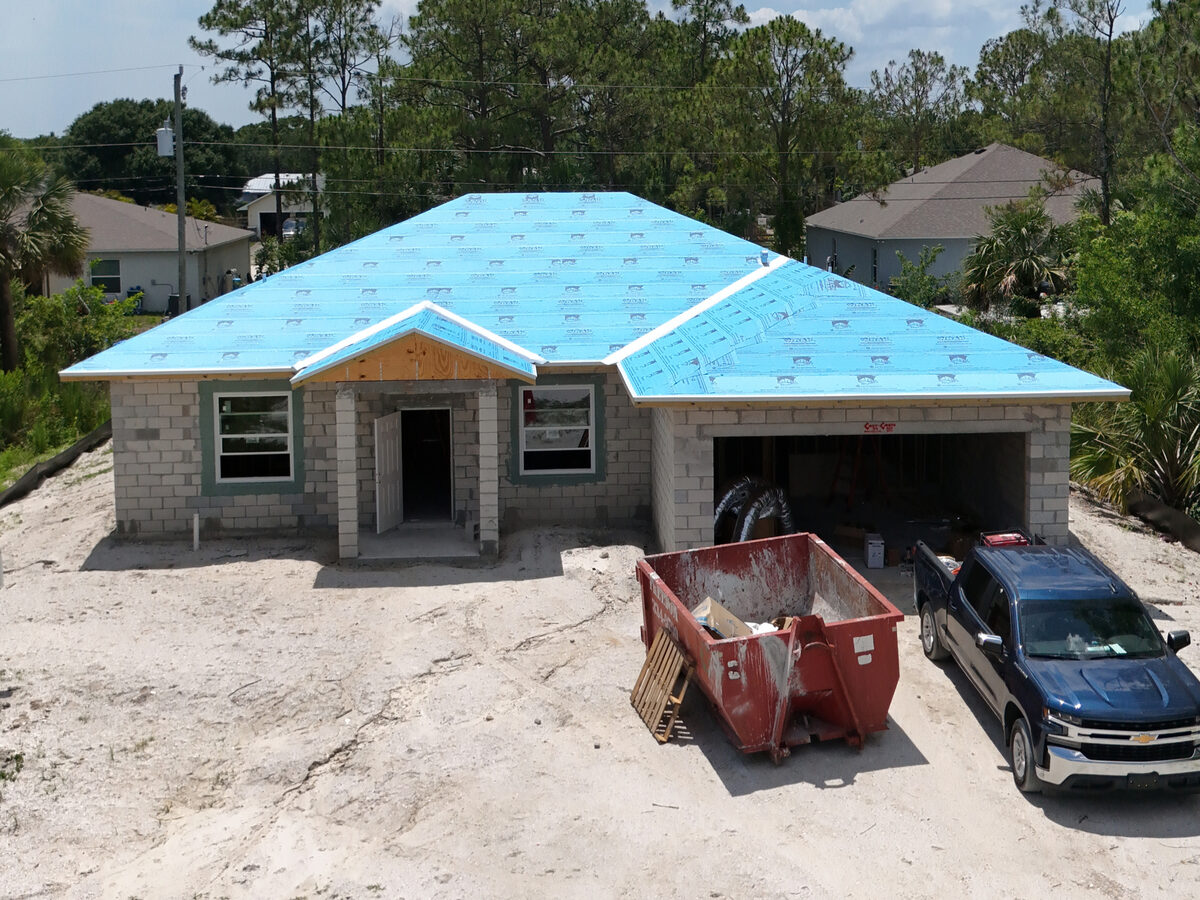 Drone front view showing underlayment with windows and entry visible